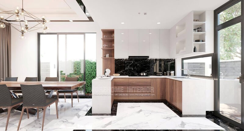 Sự phối hợp hài hòa giữa 2 tone màu chủ đạo trắng và nâu trầm mang đến một không gian nấu nướng tinh tế và không kém phần sang trọng. Thiết kế nhà bếp tiện nghi